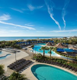 view of pool and ocean at north beach resort