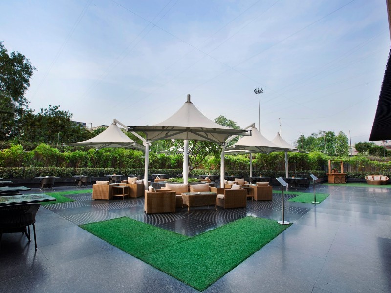 Outdoor lounge at The Lalit New Delhi