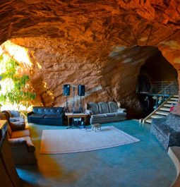 Interior of cave home with carpet and seating area