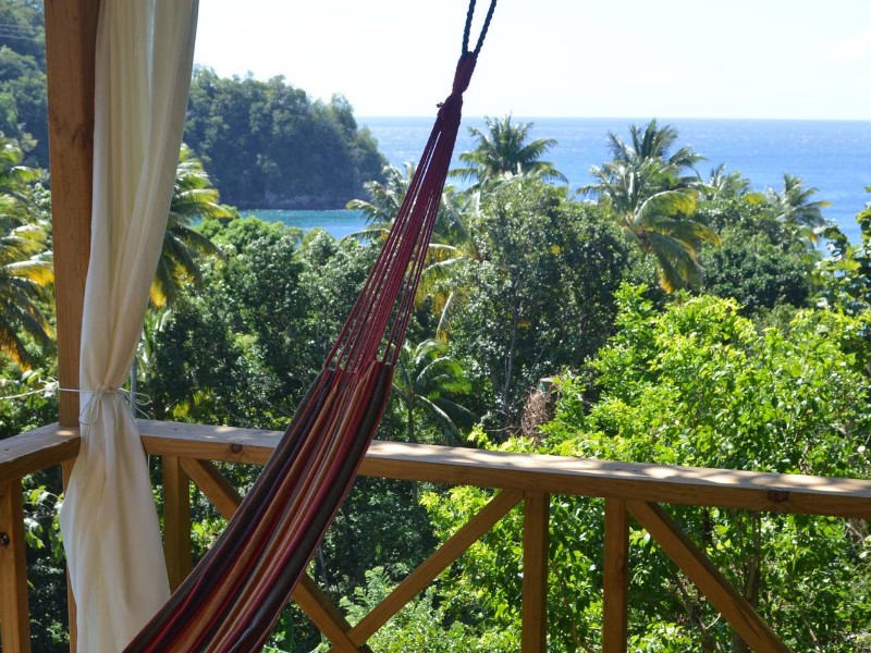 Hammock and view at Stylish Cottage by the Beach, Dominica Airbnb