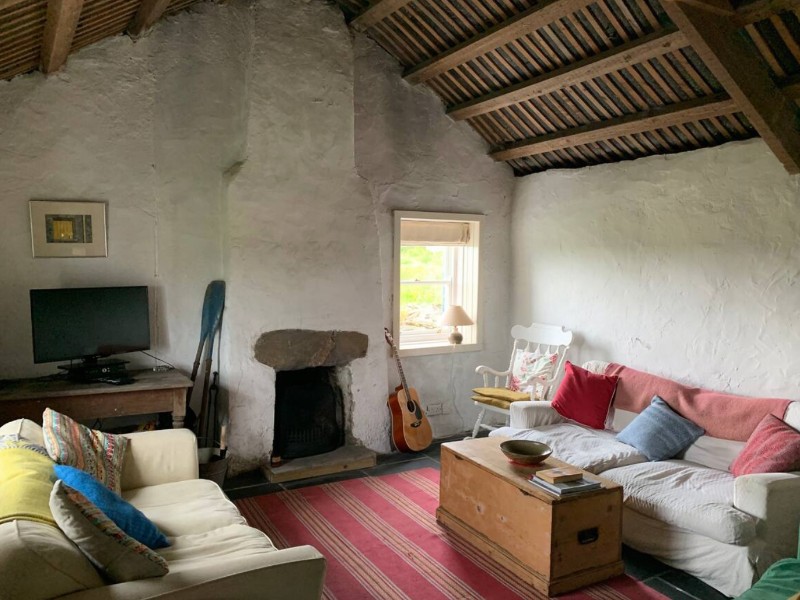 Thatched cottage near surfing beach, Lettermacaward, Ireland